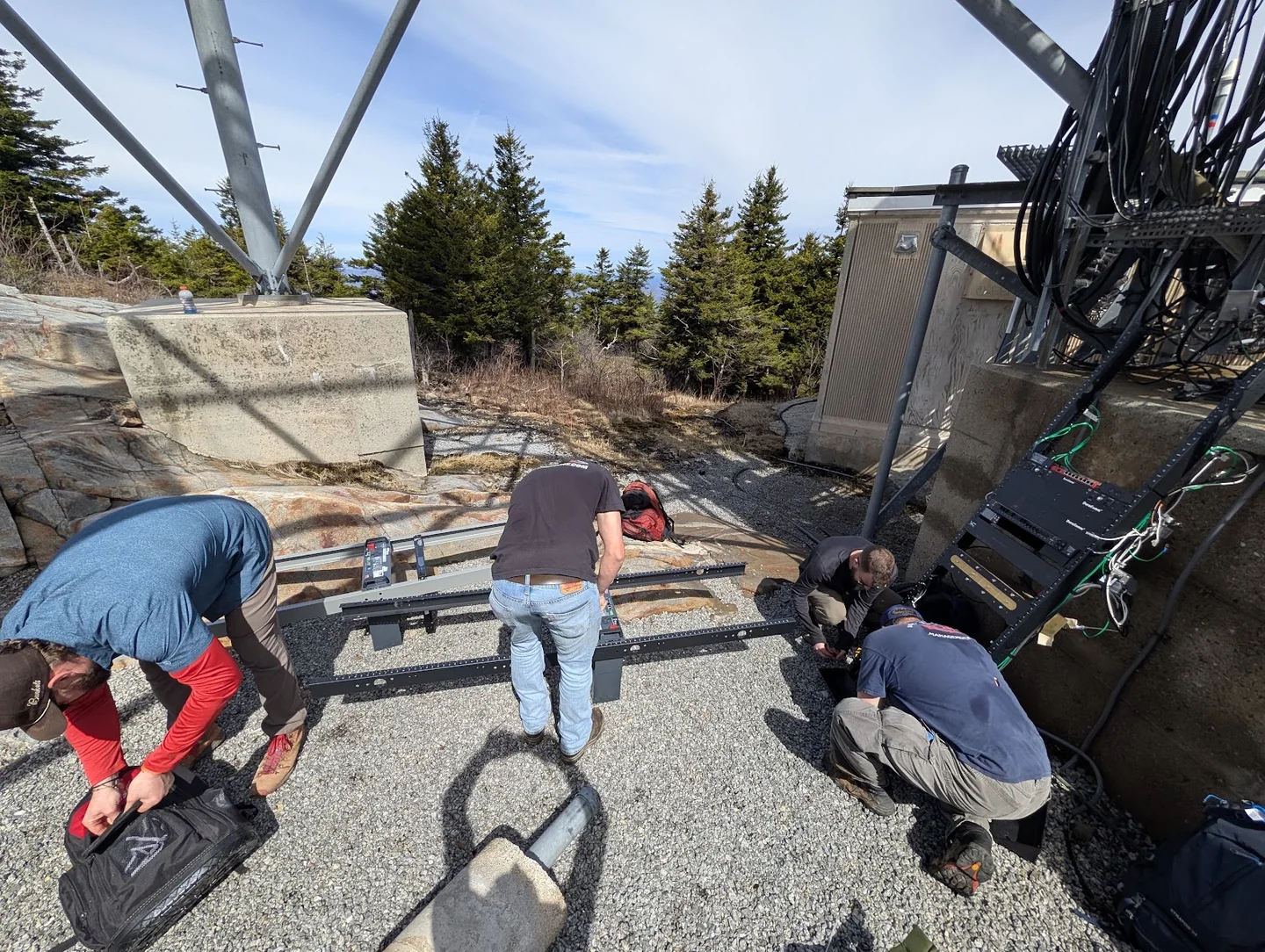 RCM team working on equipment at a communications site